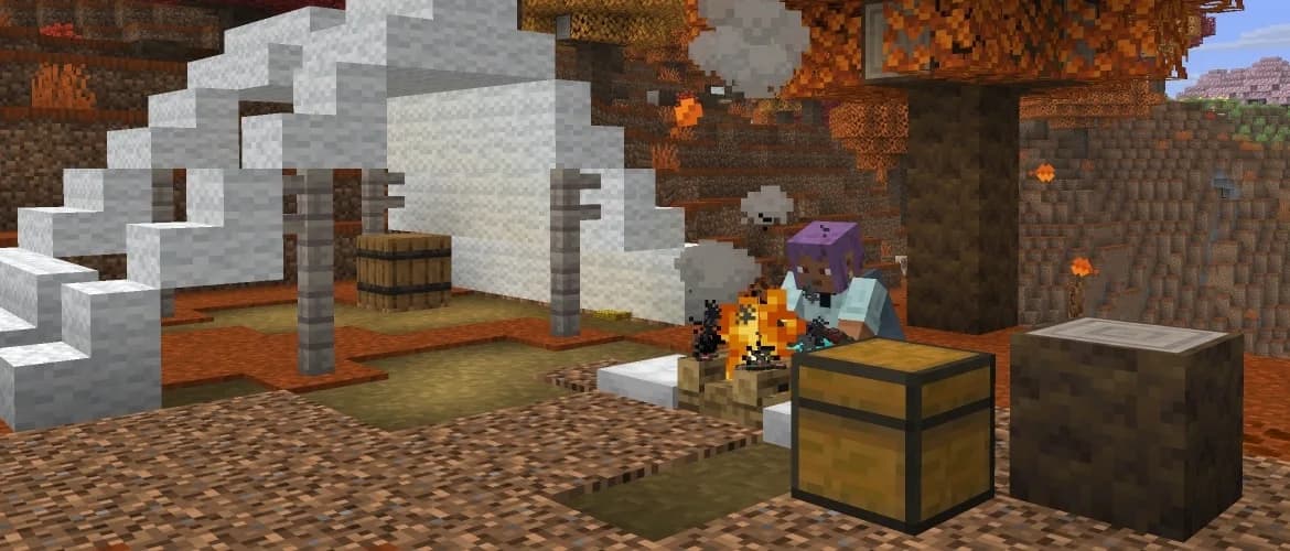 A Minecraft character sits beside a campfire in a dappled forest, next to a white tent, chest, barrel and poplar log.