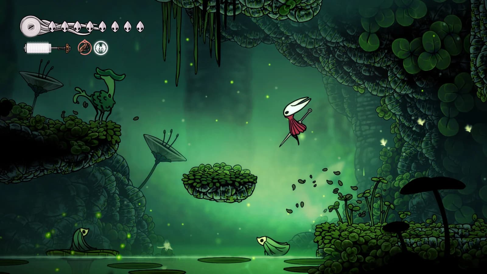 Hornet is airborne between small moss-covered platforms above water and creatures in Hollow Knight: Silksong.